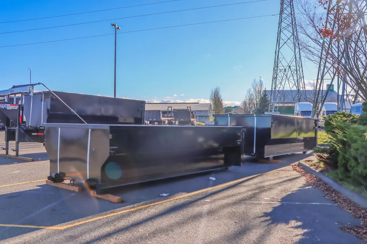 Roll-off dumpster ready for waste disposal at job site for 12 Yard Dumpster Rental in Bartlett